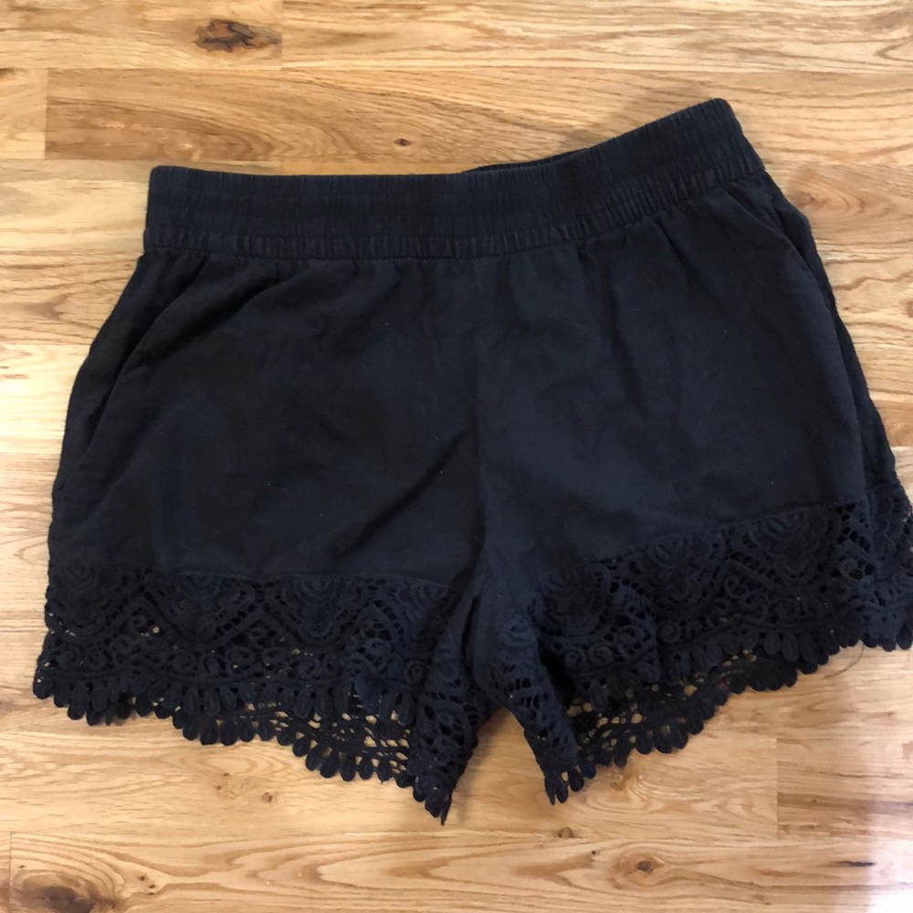 Black shorts with lace trim and pockets!